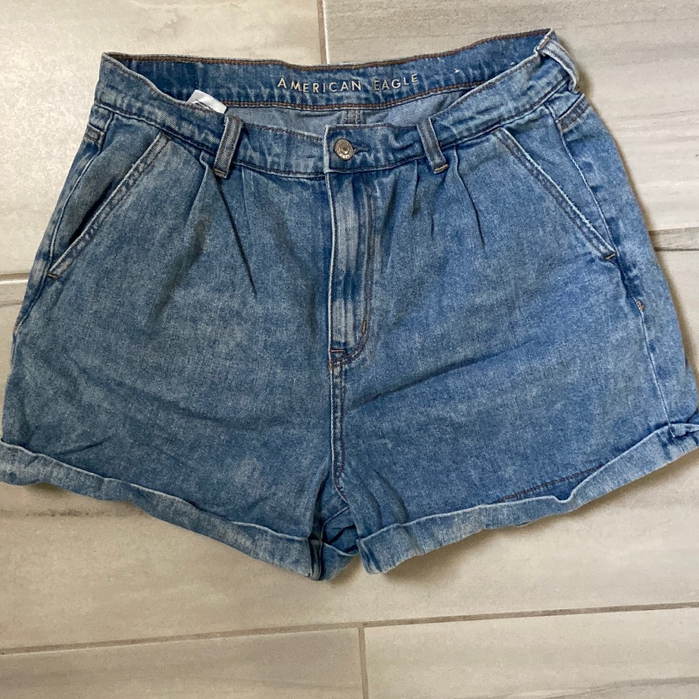 American eagle mom jeans. These are a size 10 and come up to your belly button.